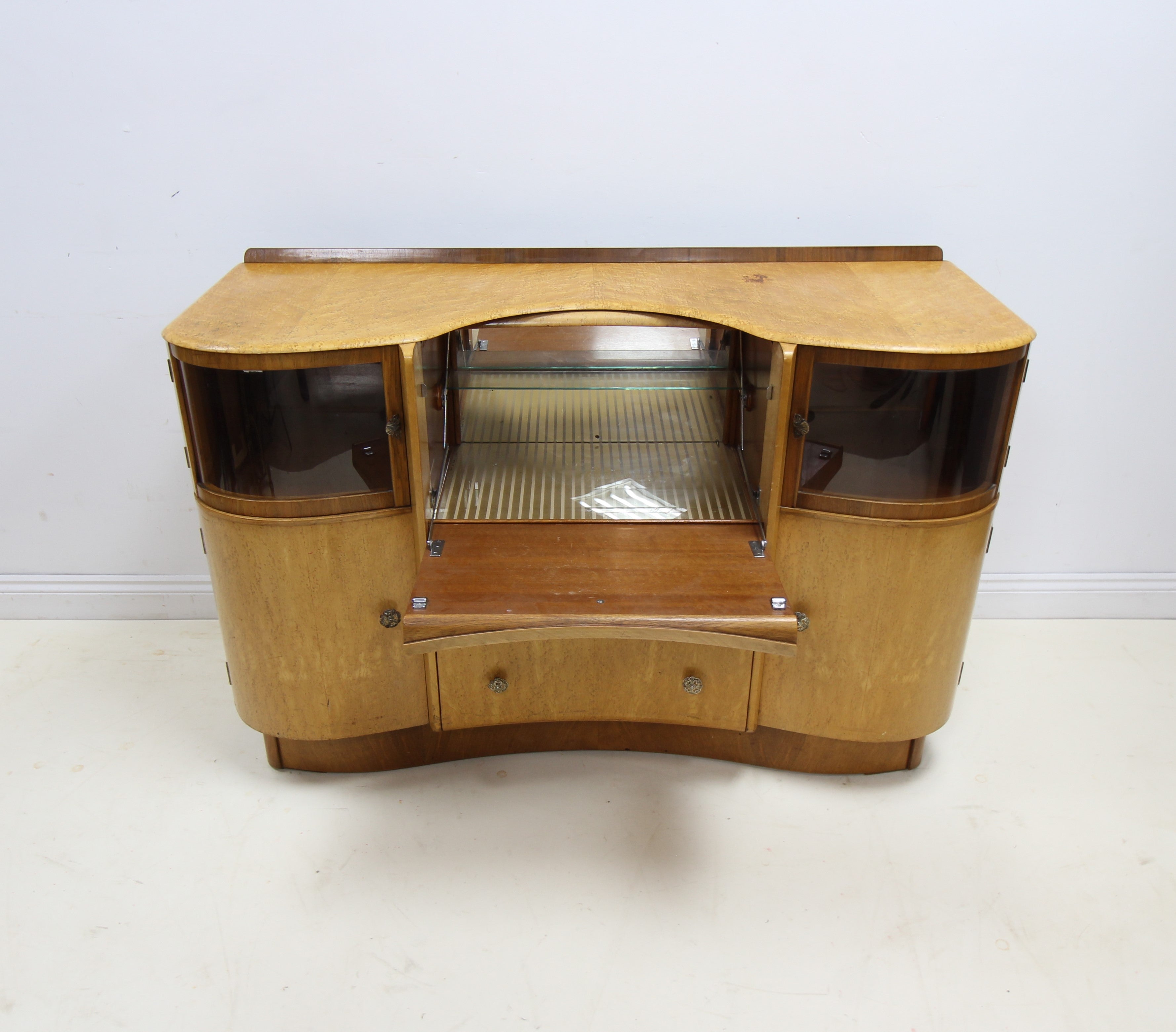 Mid century maple veneered serpentine front Beautility sideboard