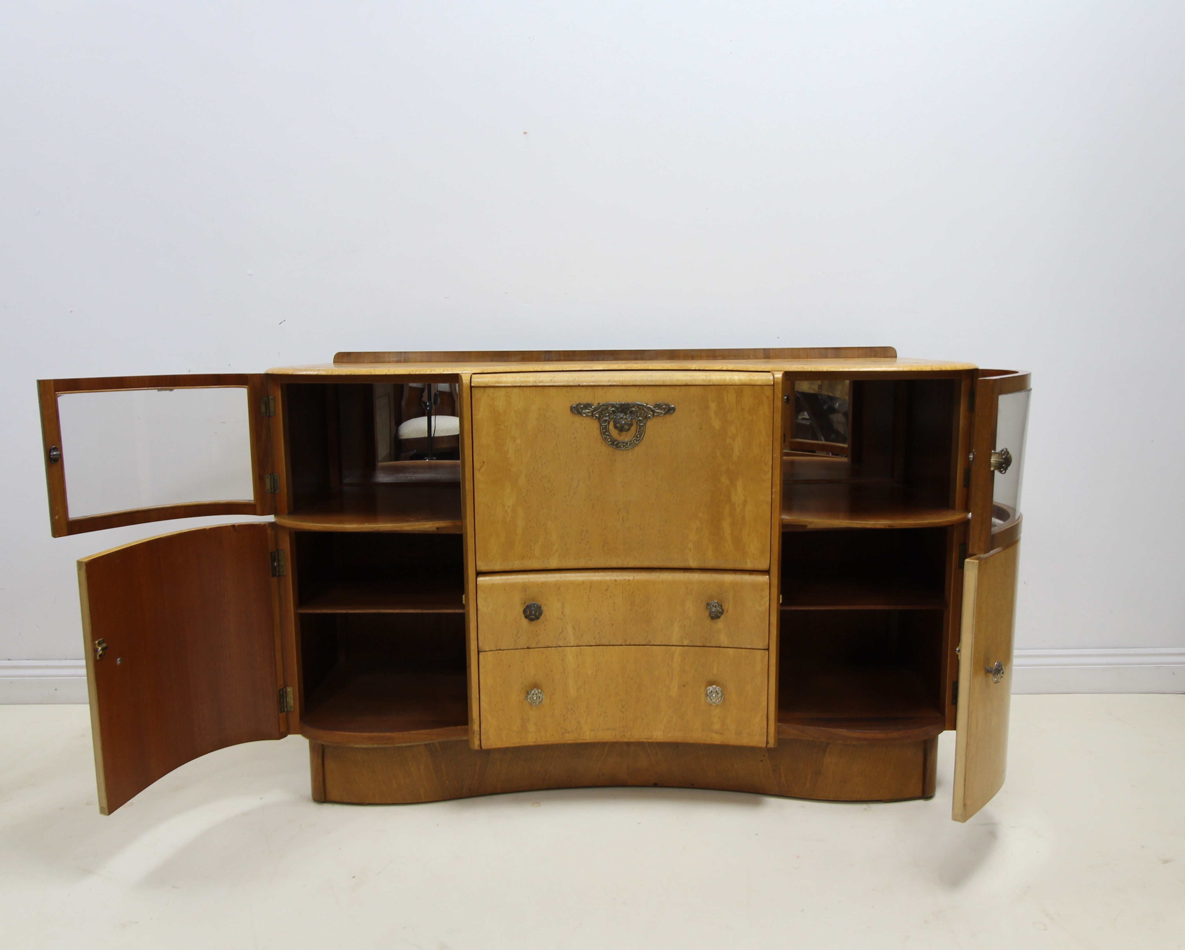 Mid century maple veneered serpentine front Beautility sideboard