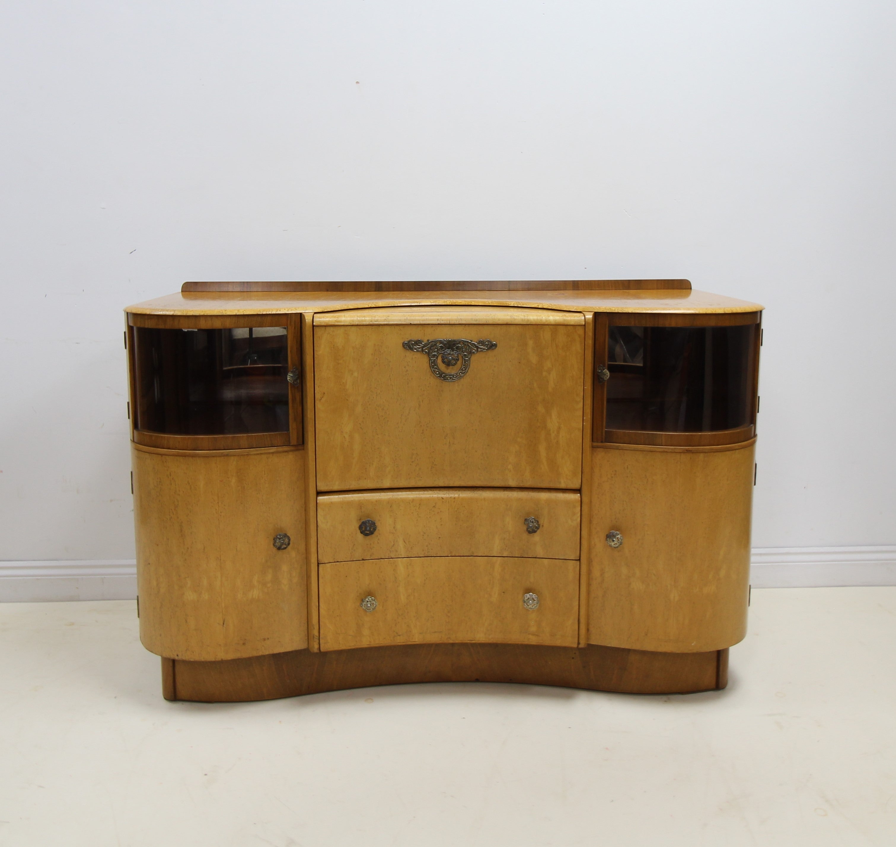 Mid century maple veneered serpentine front Beautility sideboard