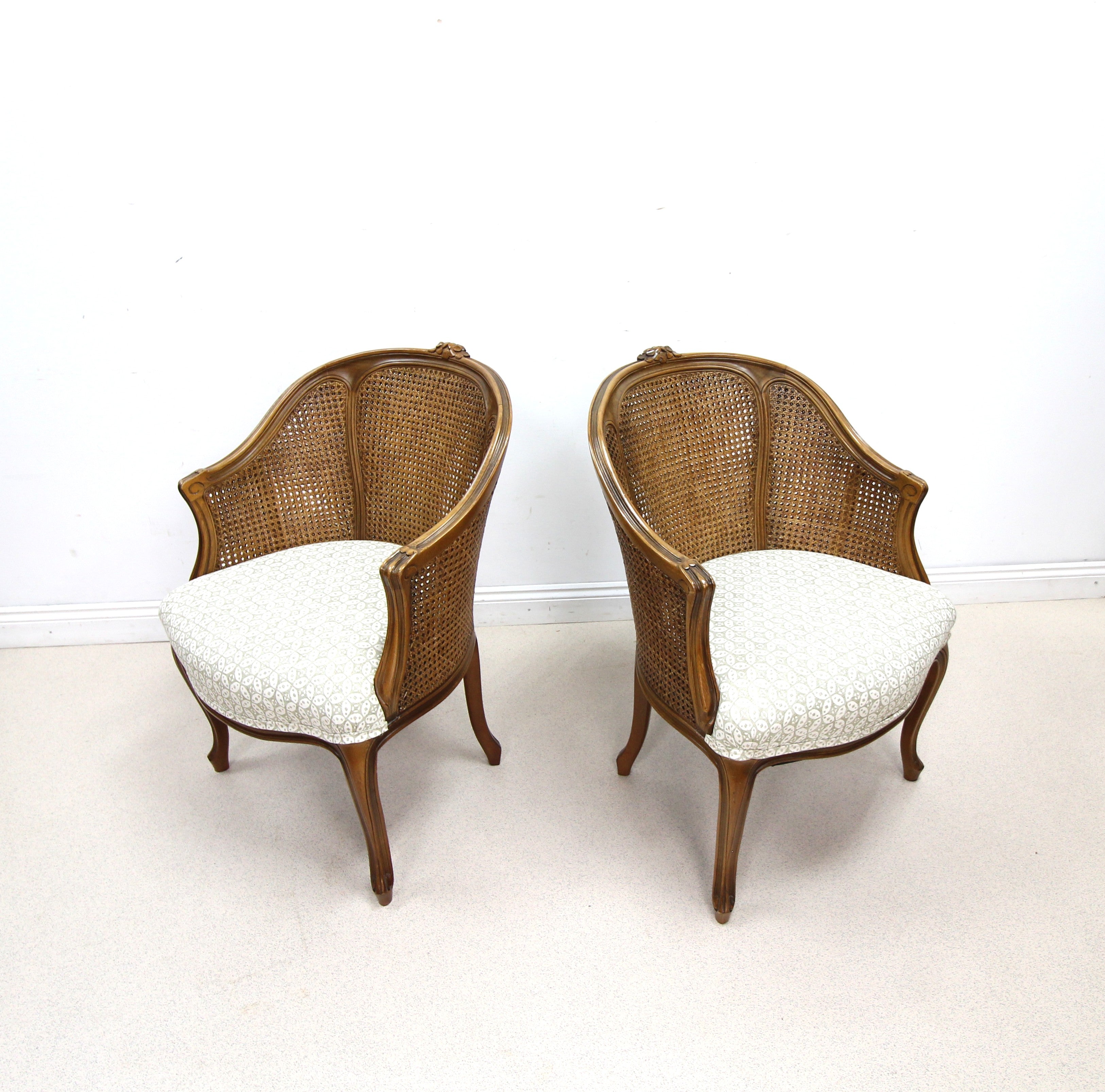 Pair of French style Bergere Caned Chairs with a Upholstered Seats