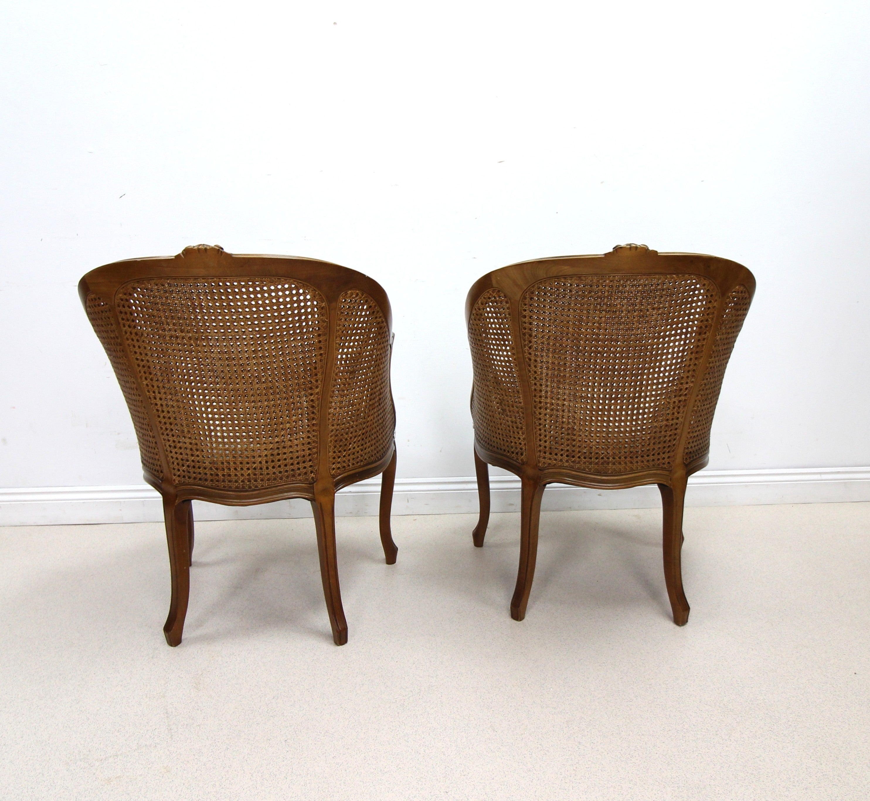 Pair of French style Bergere Caned Chairs with a Upholstered Seats