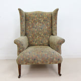 Elegant Vintage Highback Armchair on Castors