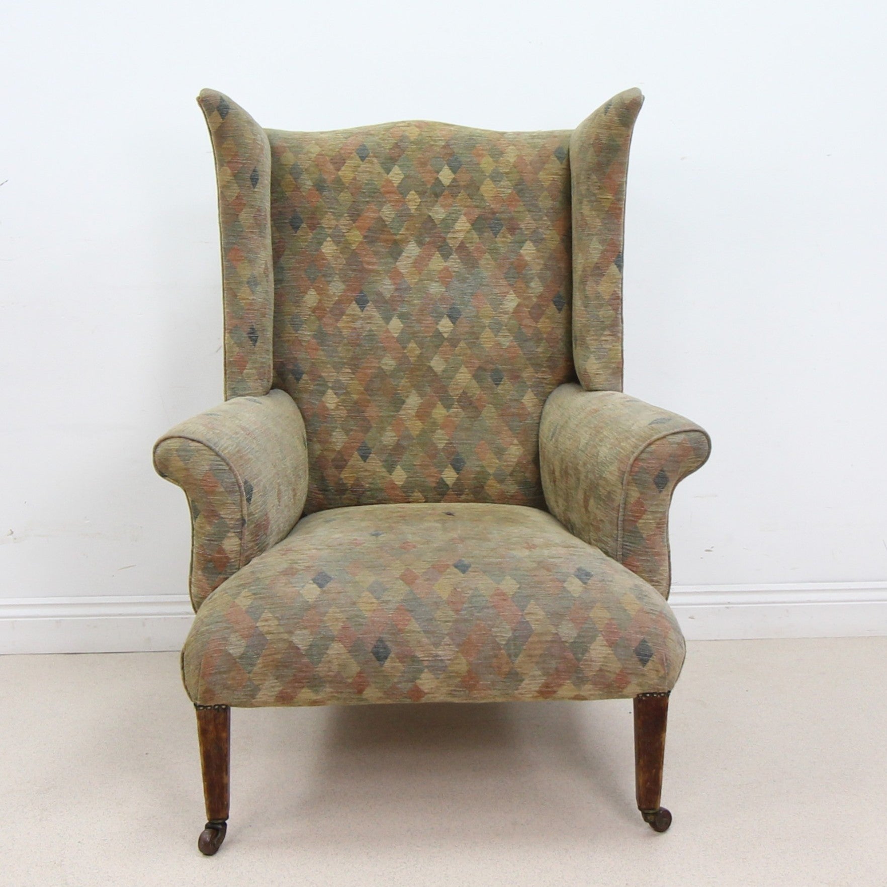 Elegant Vintage Highback Armchair on Castors