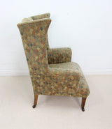 Elegant Vintage Highback Armchair on Castors