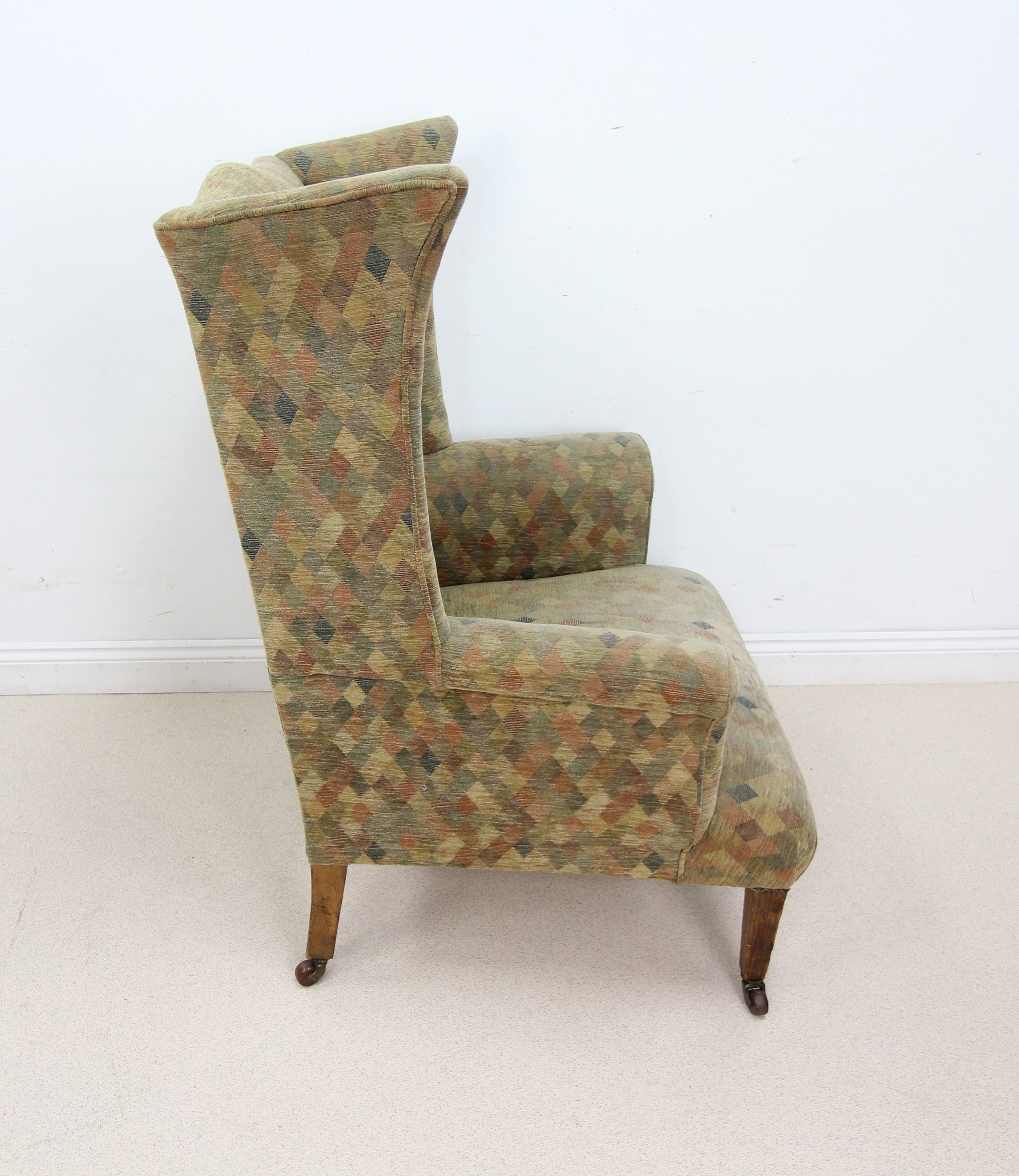 Elegant Vintage Highback Armchair on Castors