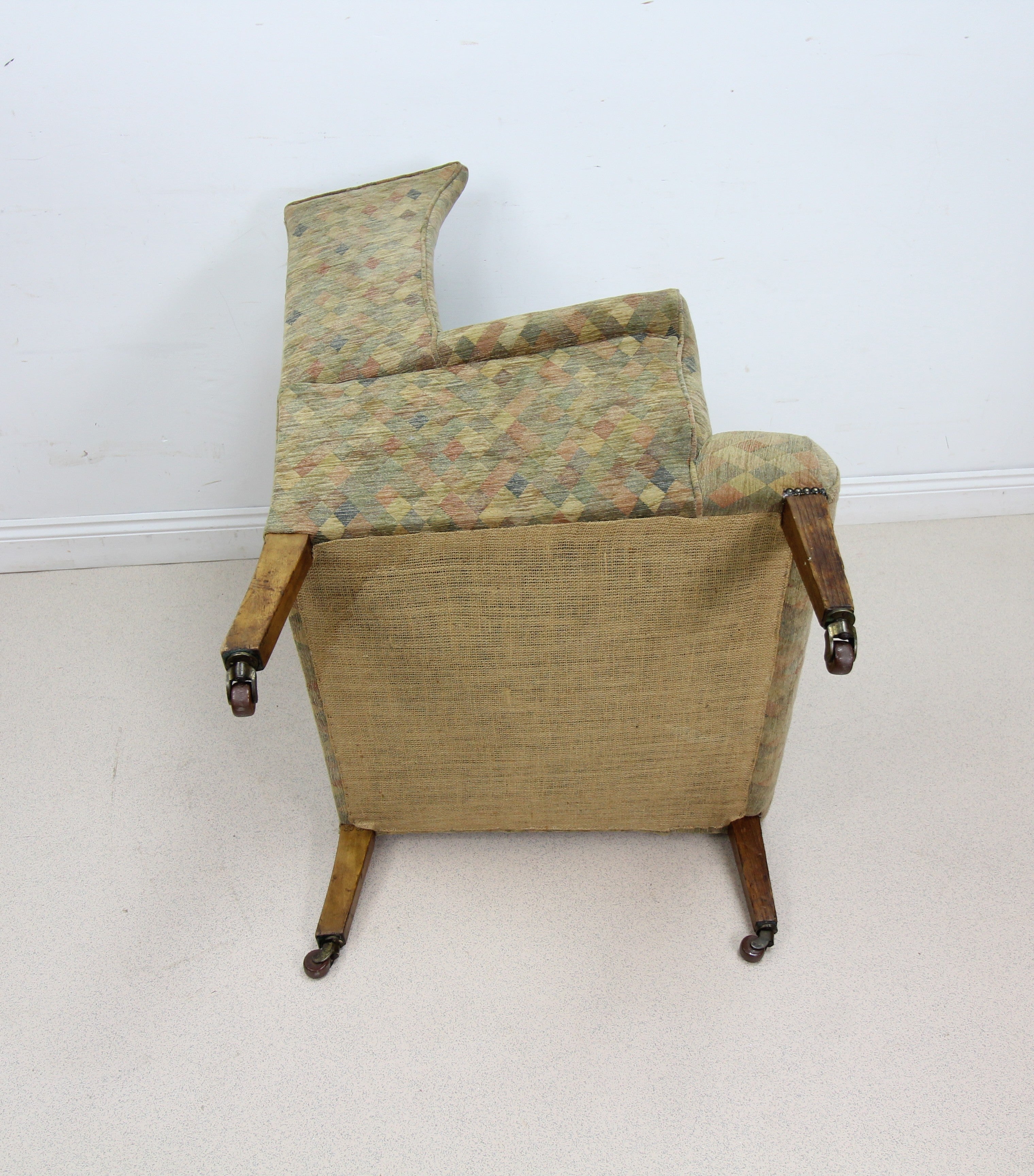 Elegant Vintage Highback Armchair on Castors