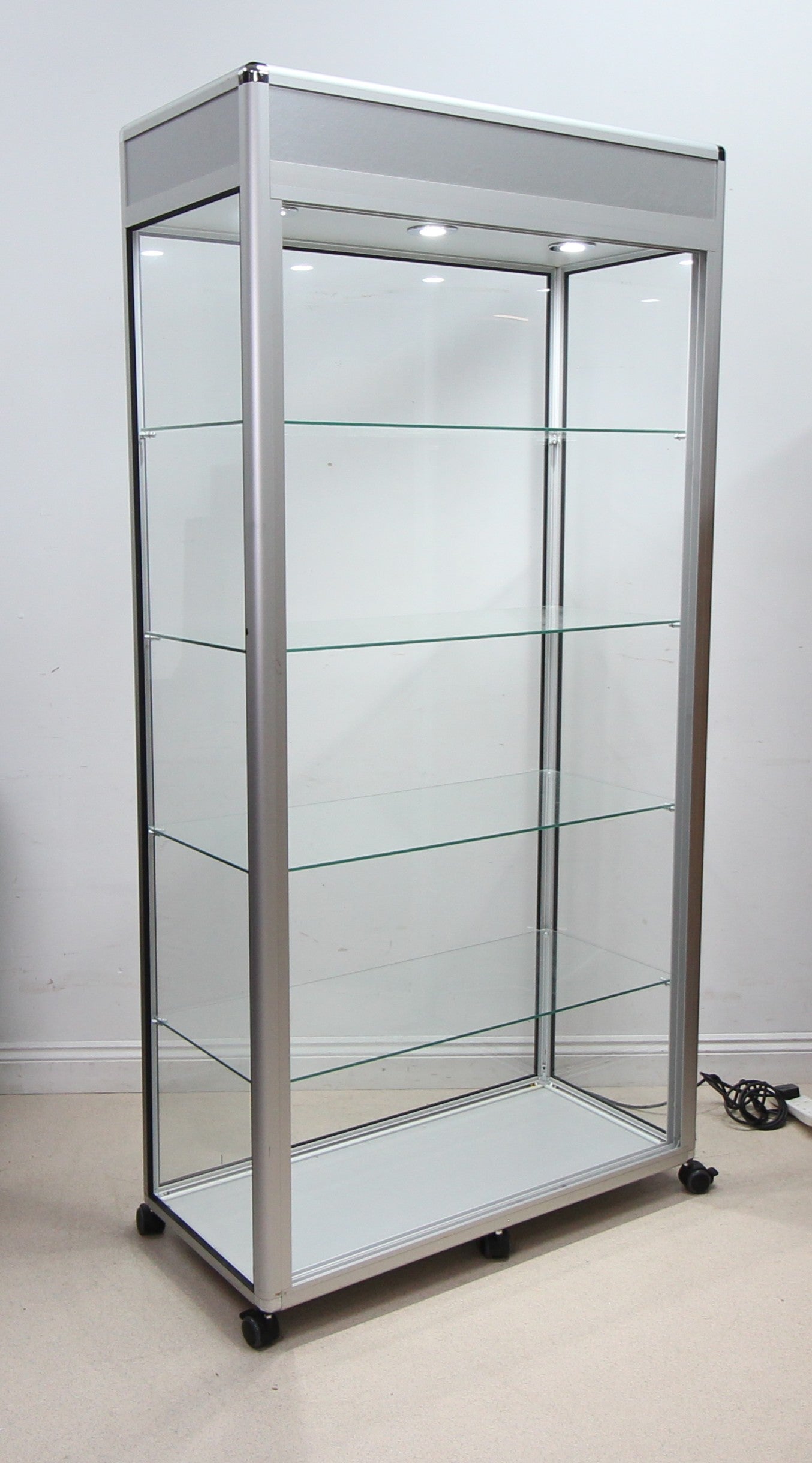A Spacious Glass Display Cabinet For Shop or Showroom -Free Standing with Lights