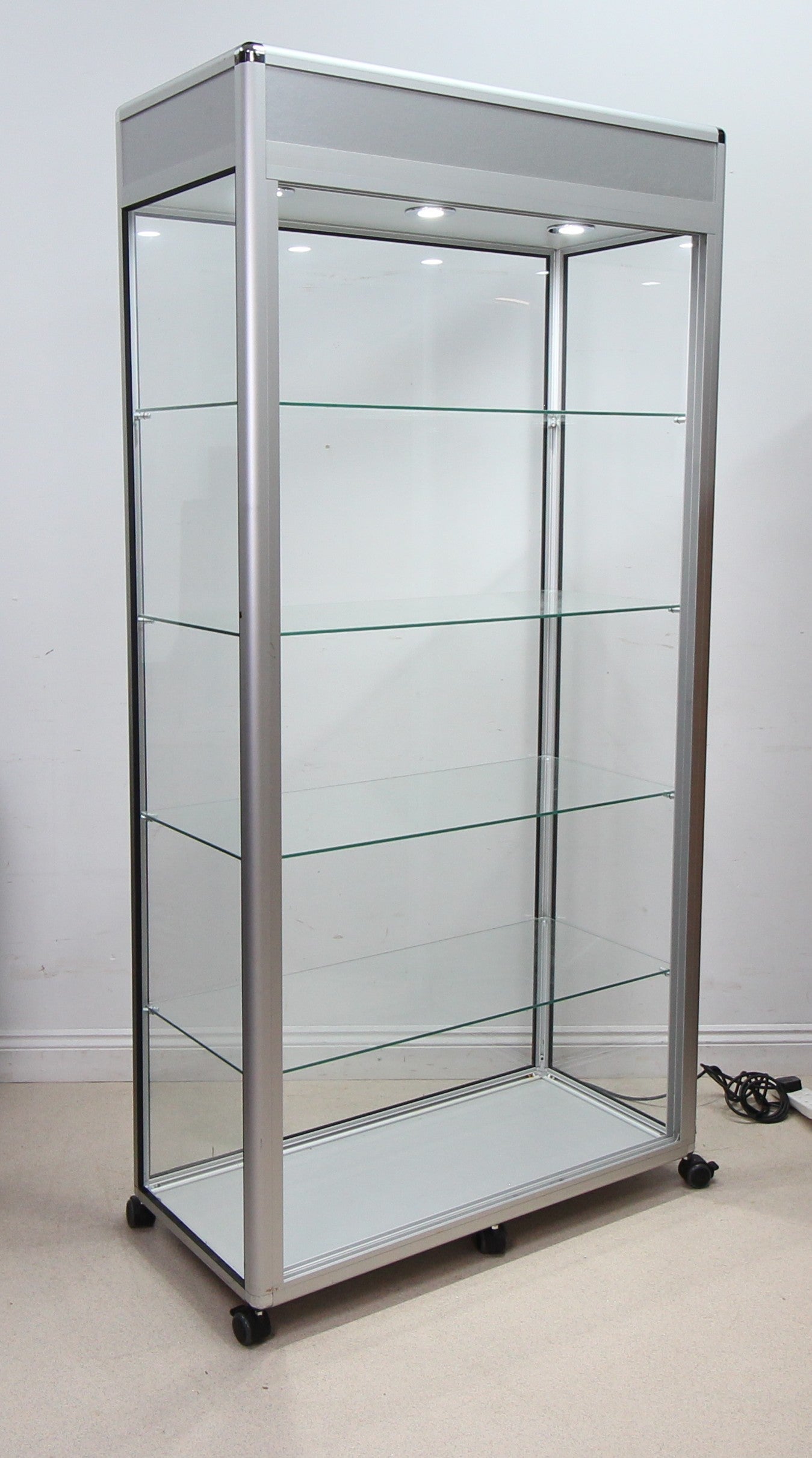 A Spacious Glass Display Cabinet For Shop or Showroom -Free Standing with Lights