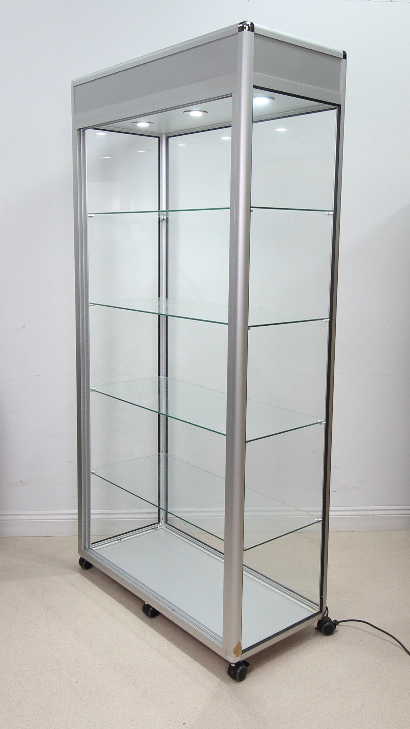 A Spacious Glass Display Cabinet For Shop or Showroom -Free Standing with Lights