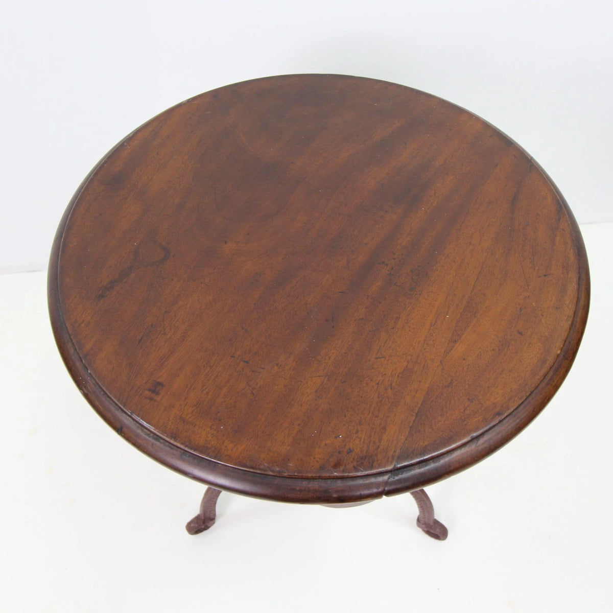 A Small Mahogany Top Cast Iron Base Table