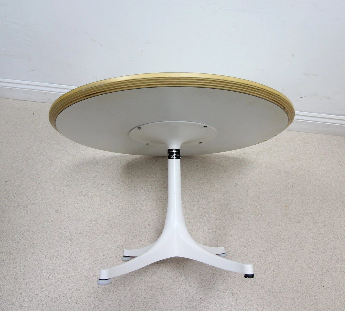 A Vitra Round White Pedestal Coffee Side Table By George Nelson