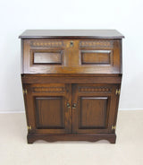 A Vintage Style Wood Effect Writing Bureau In Dark Finish
