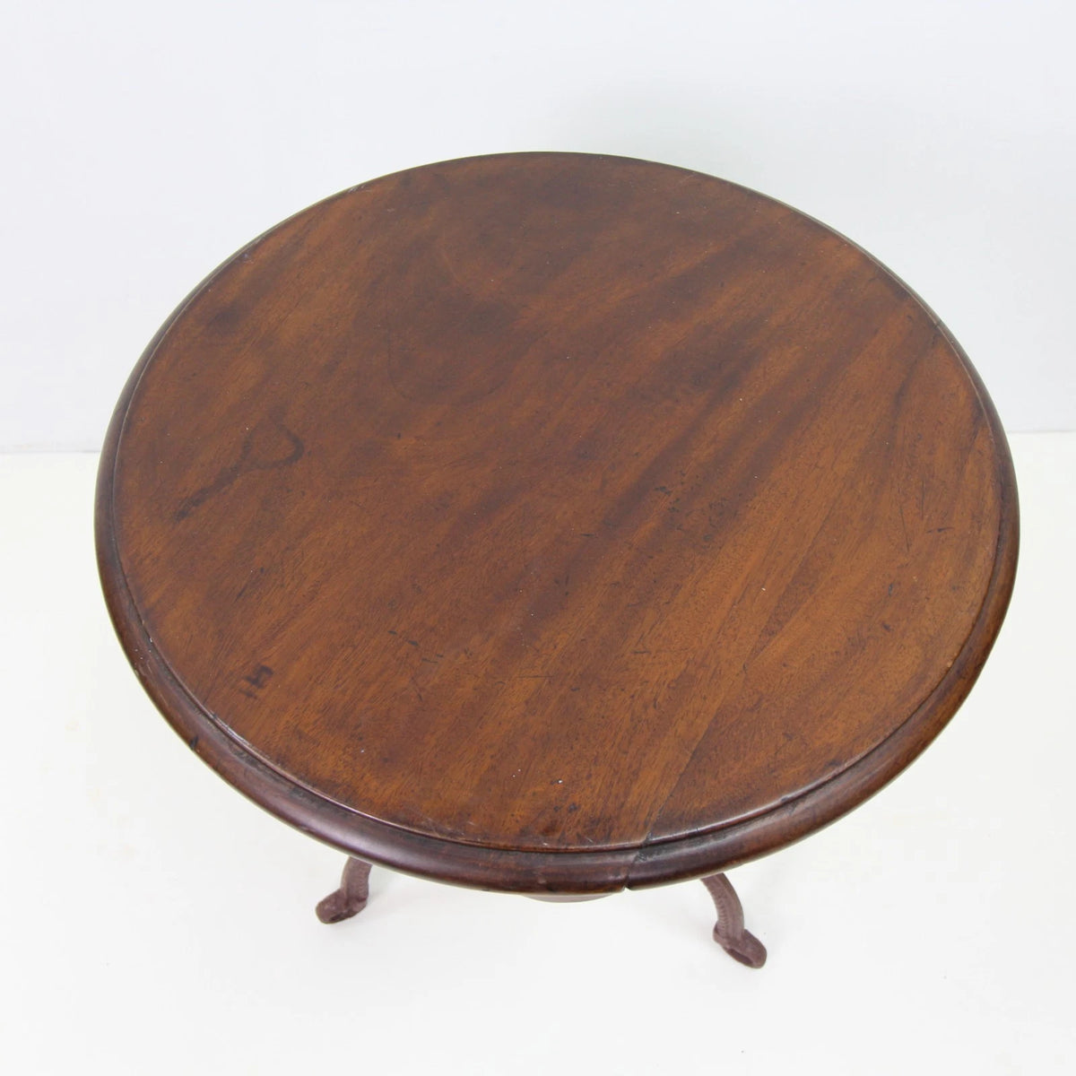 A Small Mahogany Top Cast Iron Base Table
