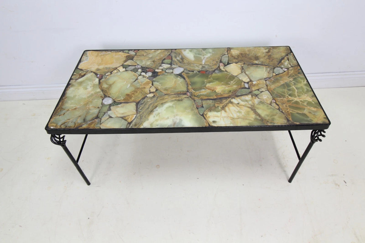 A Stone Top Metal Feet Coffee Table