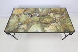 A Stone Top Metal Feet Coffee Table