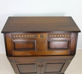 A Vintage Style Wood Effect Writing Bureau In Dark Finish